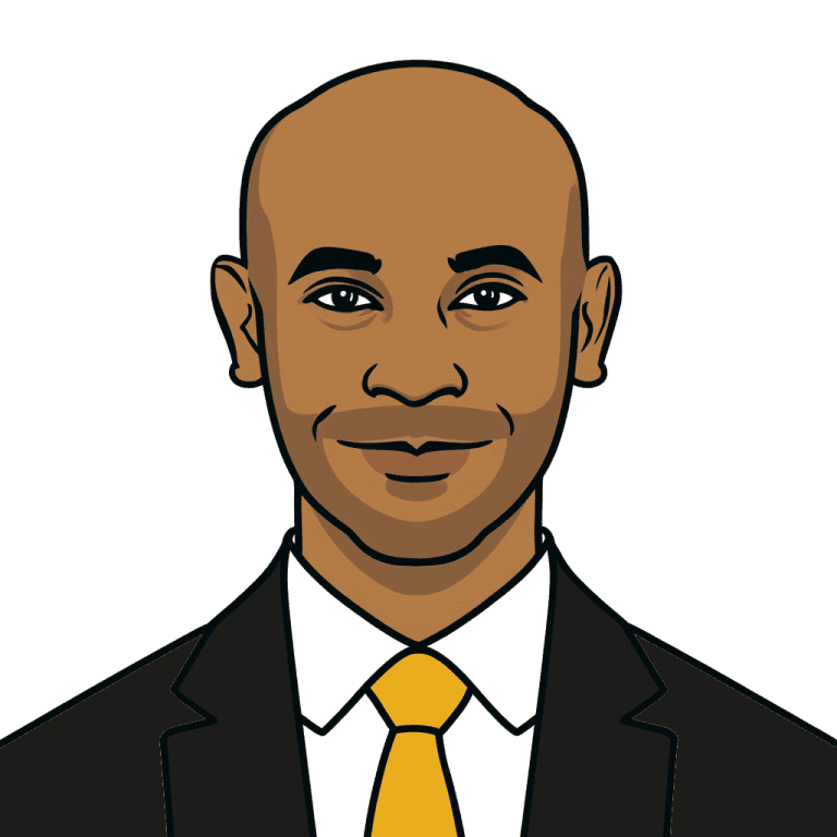 Samuel in suit with yellow tie